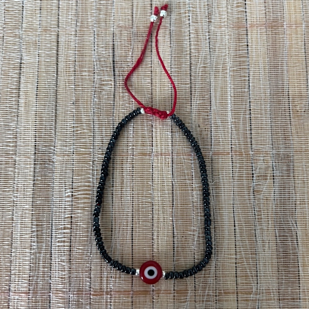 Handmade Bracelet Of Small Round Beads With Central Charm